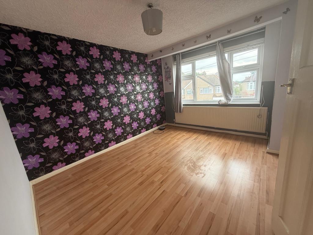 Lot: 166 - MID-TERRACE HOUSE FOR IMPROVEMENT - Bedroom with window to front aspect